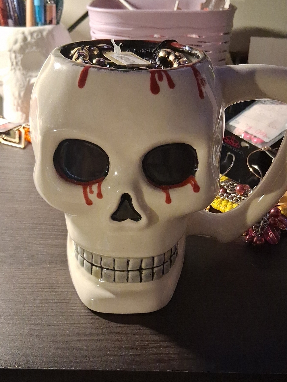 Skull Mug Filled With Jewerly.